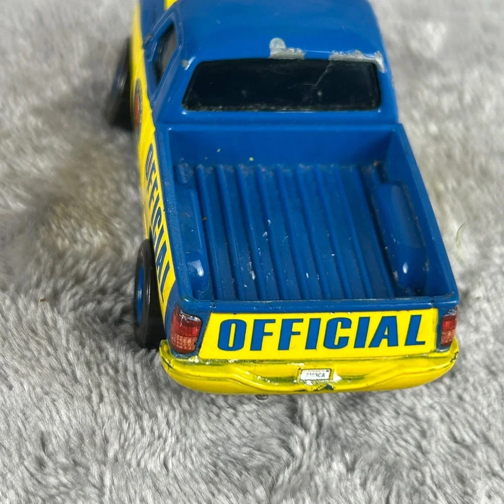 Disney Pixar Cars Piston Cup Official Truck and Sedan Diecast Lot Blue Yellow